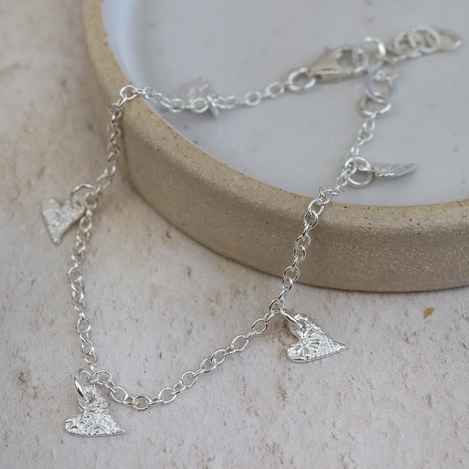 Lucy Kemp Sterling Silver Tilted Heart Charm Bracelet